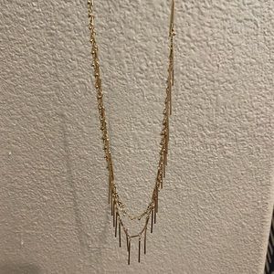 Anthropology long gold necklace. Great movement.